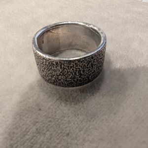 Hammered sterling silver ring handcrafted in Italy. Size 6, 10 mm wide